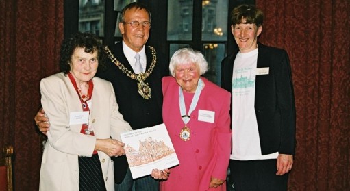 Members of the Trust, and Prue Williams, present the History of Victoria Baths book to the Major of Manchester