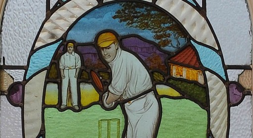Image of the stained glass cricketer window