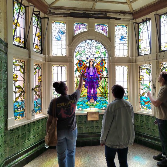 People viewing the Angel of Purity window